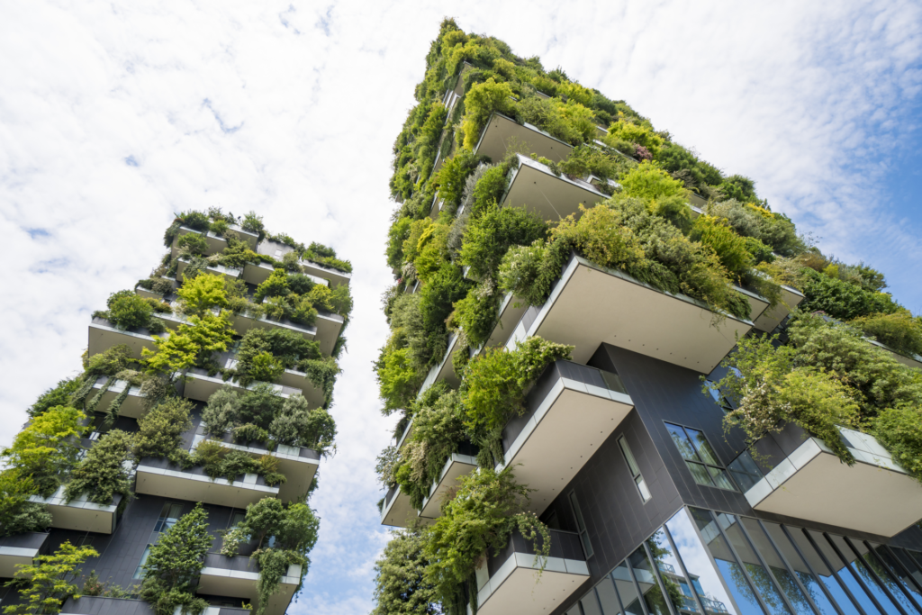 Building tower with greenery on the balconies