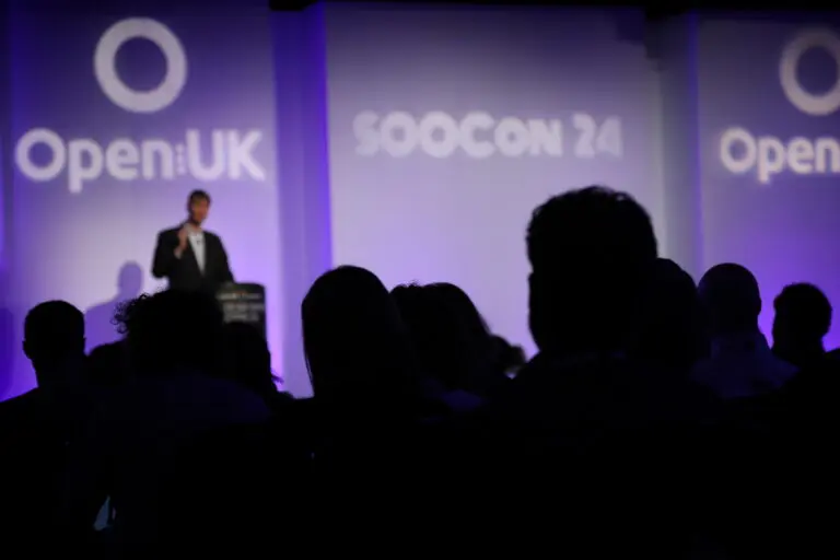 Image of the stage and audience of Open UK conference. Image provided by Open UK.