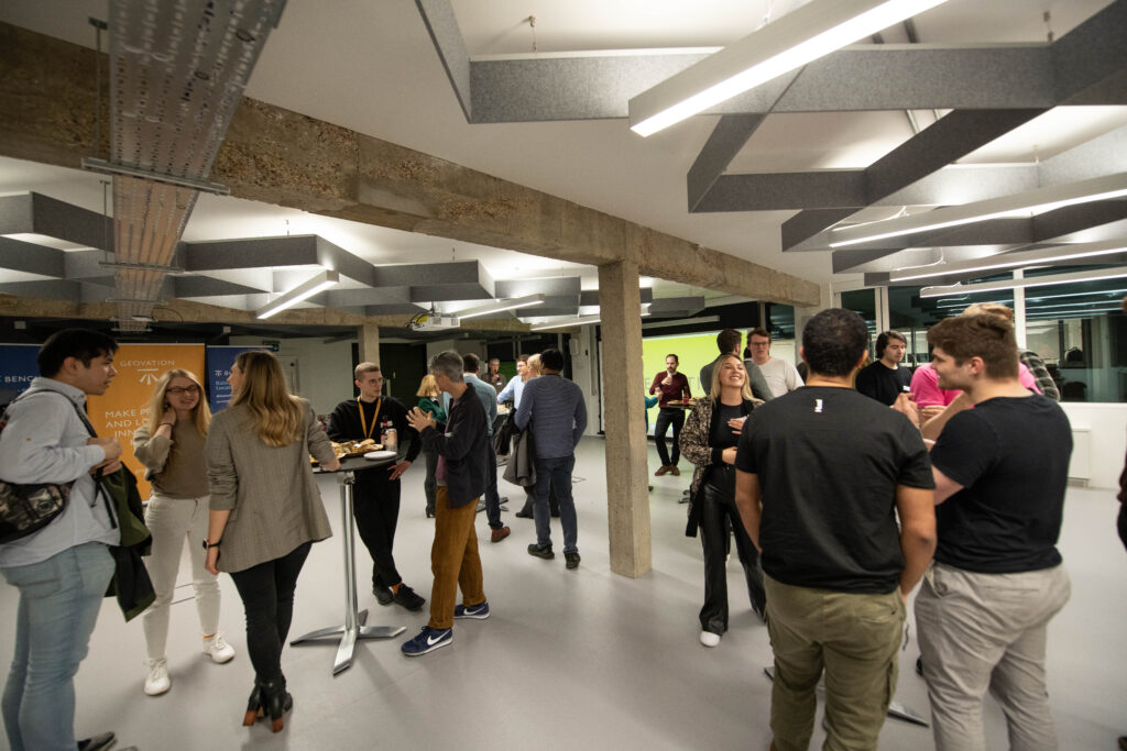 Group of people networking in the Geovation hub